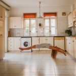 woman doing post inside kitchen