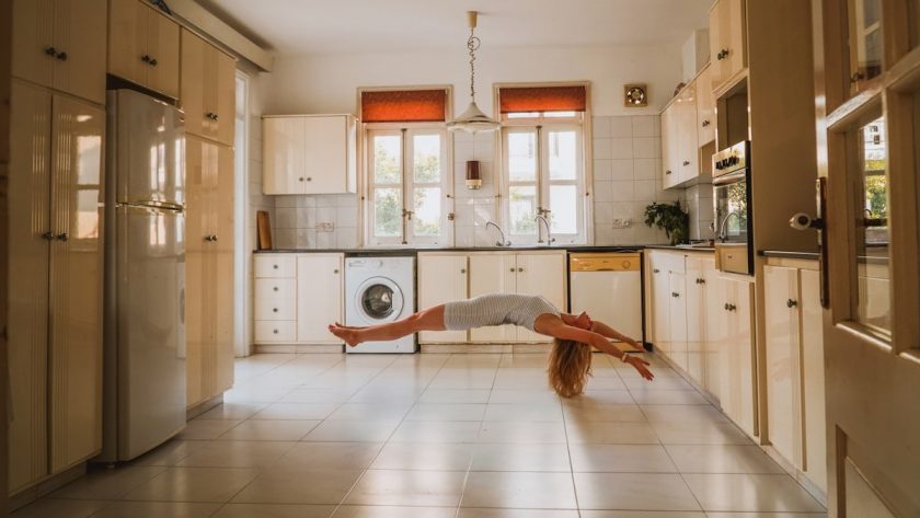 woman doing post inside kitchen